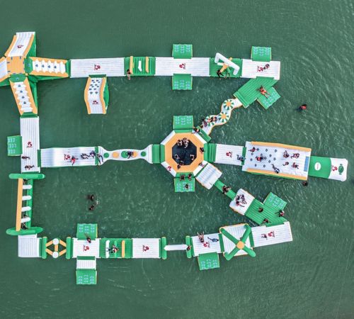 Aerial view of the inflatable water obstacle course at ICF Wake Park near Blanc Smith Hotel in Siem Reap.