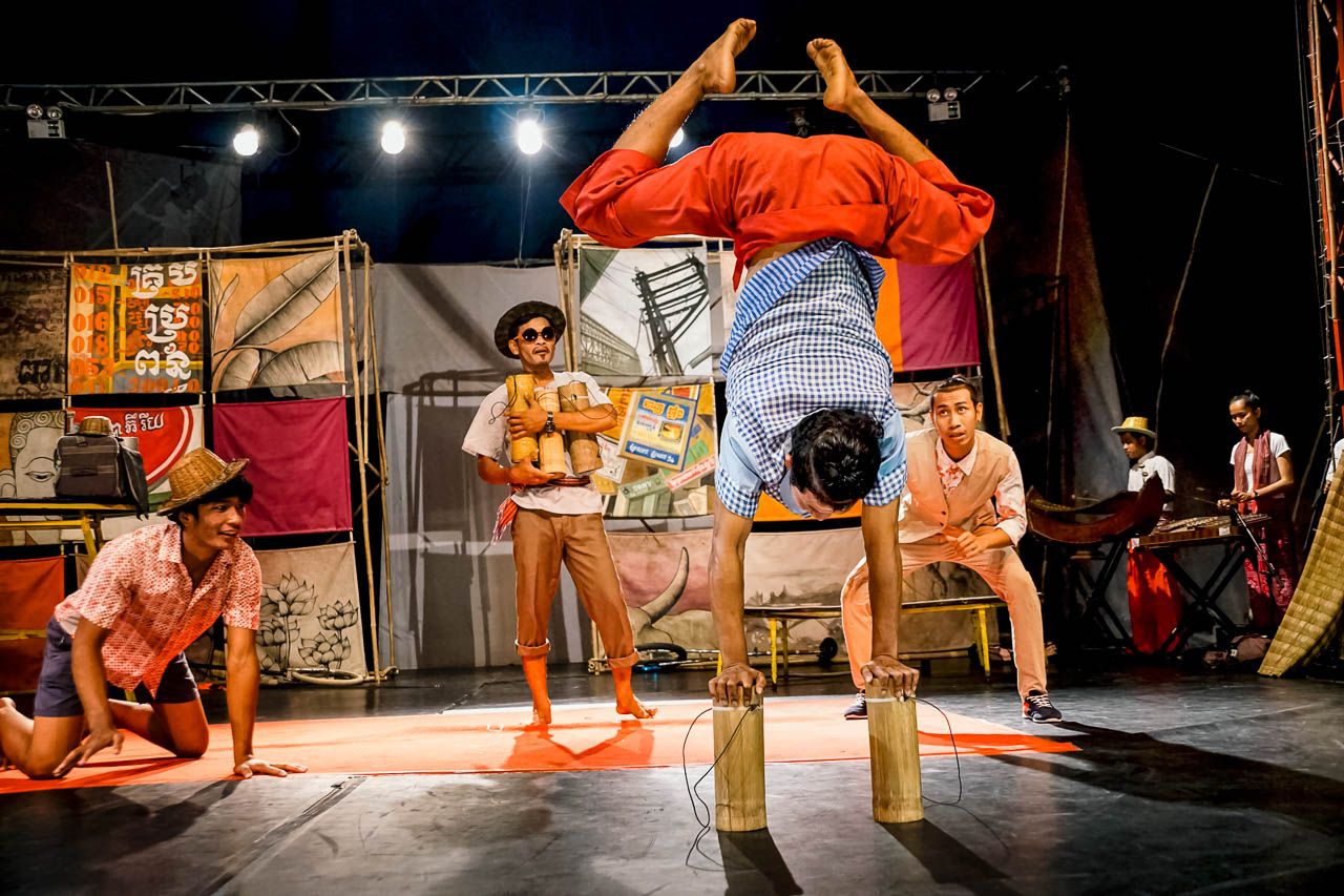 An acrobat balancing upside down on canes during a live performance at Phare The Cambodian Circus near Blanc Smith Hotel in Siem Reap.